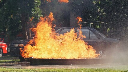 Fire explosion flammable car fire on street smoke, hot danger flame burning effect. Fire burn car...
