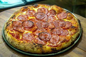 Pepperoni's true rustic pizza with sourdough mass fermented with Levain. A perfect vera pizza, perfect for advertising.