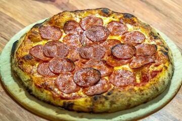 Pepperoni's true rustic pizza with sourdough mass fermented with Levain. A perfect vera pizza, perfect for advertising.