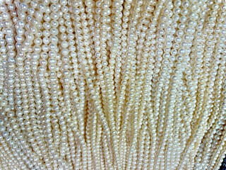 Whitw pearl background and texture. Beautiful freshwater white pearl 