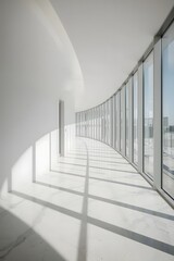Fototapeta premium Minimalist modern architectural corridor with curved white walls, tall glass windows, and natural light casting geometric shadows on marble floor, perfect for clean design, architecture, and backgroun
