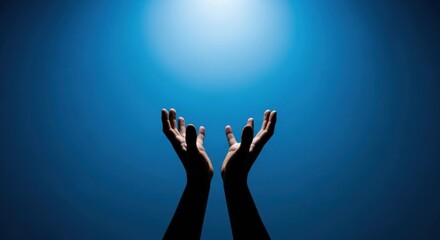 Hands reaching up toward a bright light against a blue gradient background evoke themes of hope, faith, and spirituality, suitable for inspirational or religious content.