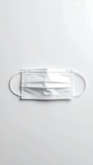 Empty face mask laying flat without human presence