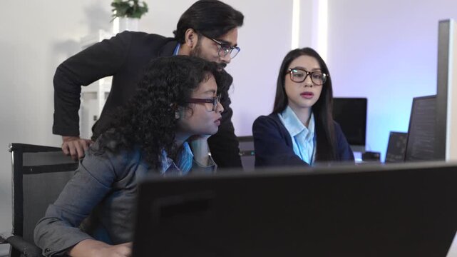 A senior developer mentoring a colleague, pointing at code during a pair programming and debugging session. Concept for teamwork, mentorship, and agile software developm