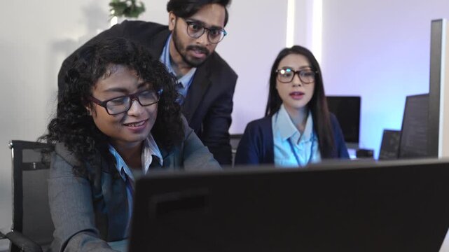 A senior developer mentoring a colleague, pointing at code during a pair programming and debugging session. Concept for teamwork, mentorship, and agile software developm