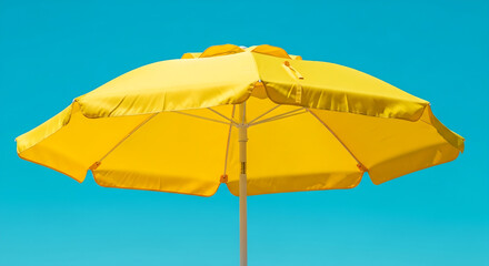 Obraz premium yellow umbrella on blue background