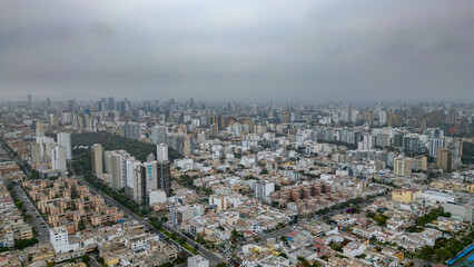 Aerial View of Lima City Highlighting Lince and San Isidro Districts.