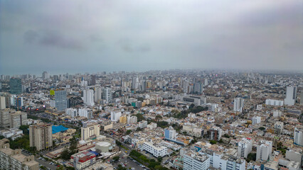 Obraz premium Drone Photograph of the Vast Cityscape of Lima during a Cold Winter.