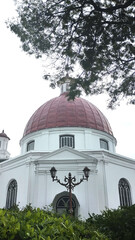 Semarang, July 2025, 12 - Blenduk Church building from the side with clear sky in portrait view