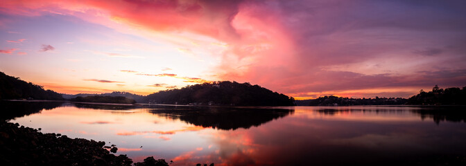 Scenic view of Georges River under Como Bridge during sunset