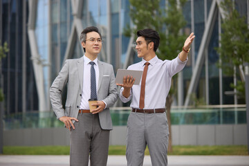 Business associates talking about work