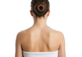 Rear view of woman with hair in bun and towel around her body on transparent background