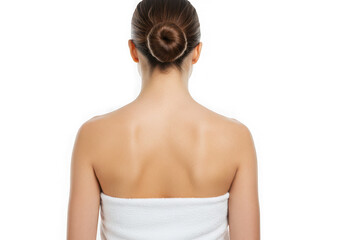 Back view of woman with hair in bun and white towel wrapped body on transparent background