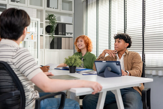 Group of diverse Generation Z businessman and woman working in the office.