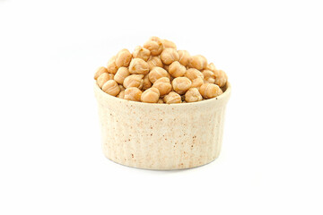 Chickpeas in a bowl on a white background. Scientific name: Cicer arietinum) is a plant in the legume family. The seeds are high in protein.