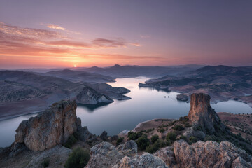 breathtaking view of reservoir edge in algeria at sunset dramatic contrasts
