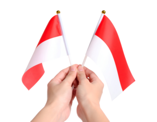 hands together holding the red and white Indonesian flag isolated on transparent png