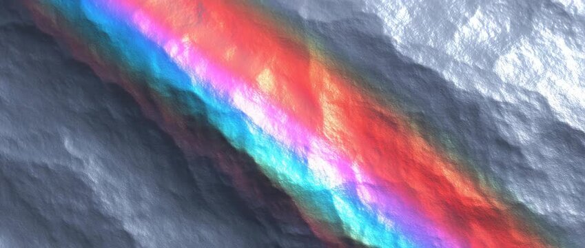 A colorful rainbow appears above a textured, gray surface, suggesting a moment of hope after a storm. The vibrant display of colors contrasts with the stark background.