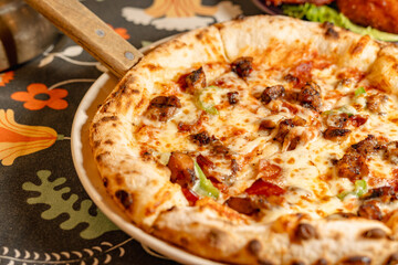 Delicious Italian Pizza with Sausage and Bell Peppers