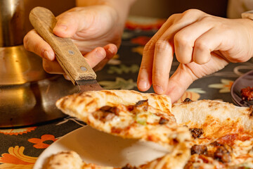 A Moment of Making Delicious Pizza with Careful Hands and Fresh Ingredients