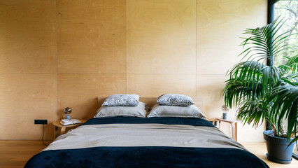 Cozy hotel bedroom featuring a comfortable bed and modern interior design