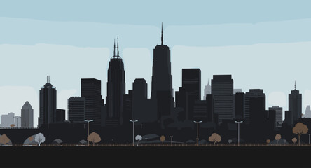 Obraz premium Modern cityscape silhouette with skyscrapers and urban park elements under a clear sky.