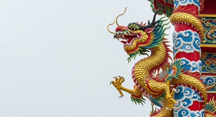 A golden intricate dragon statue with horns and claws climbing a red ornate pillar against a gray sky