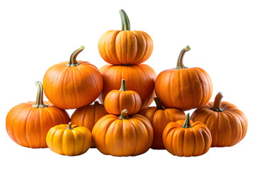 Obraz premium A festive arrangement of numerous orange pumpkins stacked and clustered together, isolated on a transparent background for autumn