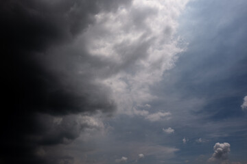 Obraz premium Dark sky with stormy clouds. Dramatic sky rain,Dark clouds before a thunder-storm,clouds before rain 