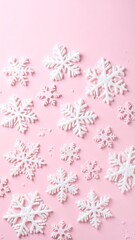 White snowflakes on pink background