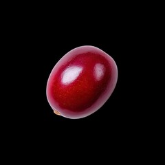 Fresh Red Fruit Isolated on Black Background with Smooth Surface and Natural Shine for Editorial and Commercial Use