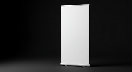 A tall upright retractable banner stand is positioned against a stark black backdrop