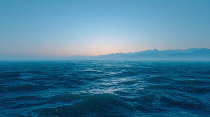 Obraz premium A Captivating Landscape of Tranquil Ocean Waves Under a Dusk Sky, Inviting Serene Exploration and Reflection on Nature's Beauty and Vastness