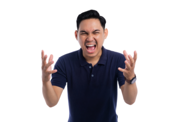 Angry young Asian man shouting with frustrated expression and hands up isolated on transparent background