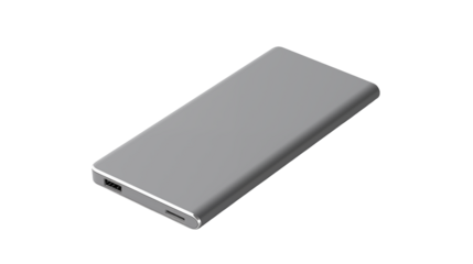 A close up of a rectangular gray power bank isolated on a black background in a studio setting