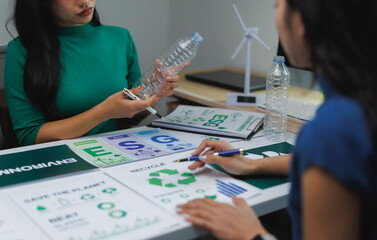 Businesswomen discussing environmental, social, and governance - esg - in office meeting