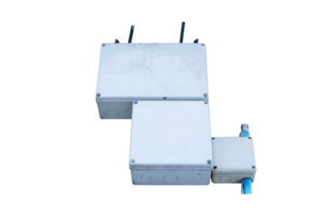 Modern Wi-Fi router large for 5G with box small plastic wiring with pipe isolated on cutout PNG or transparent background. Provide internet. White wireless technology side mounted signal control box.