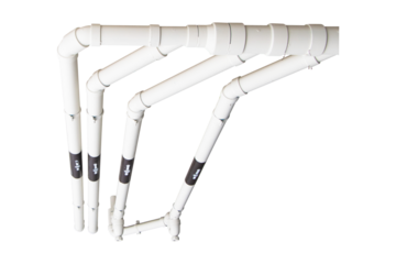 Plumbing rough-in or electrical conduit in commercial building with pvc pipe in construction site of apartment. Structure plastic pipes white isolated on cutout PNG or transparent background.