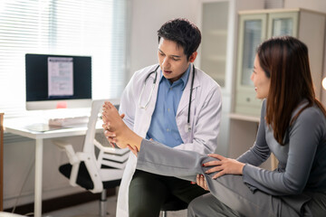 Fototapeta premium doctor is examining a woman's foot
