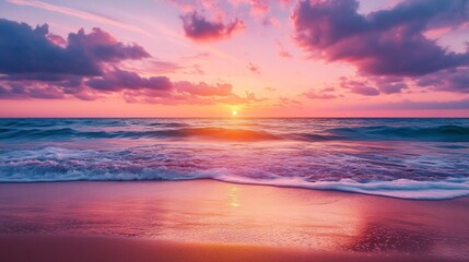 Fototapeta premium Pink and Purple Sunset Over Ocean Waves on a Sandy Beach Shoreline