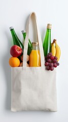 Reusable Canvas Shopping Bag with Groceries – Wine, Juice, Fruits, and Nuts on White Background