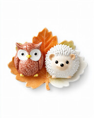 Fototapeta premium Ceramic Owl Hedgehog Decorative Figures Autumn Animal Friends Cute Pets Home Accessory Nature Design Fall Leaves Colorful Whimsical Handcrafted Artistic Ornament Gift Forestlife Playful Toy Warmth 