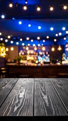 Fototapeta premium Dark wood tabletop in a blurry bar scene