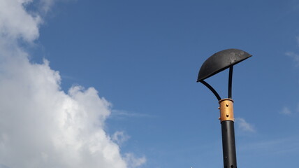 Electric lights in the blue sky when the weather is clear. Lights for street lighting