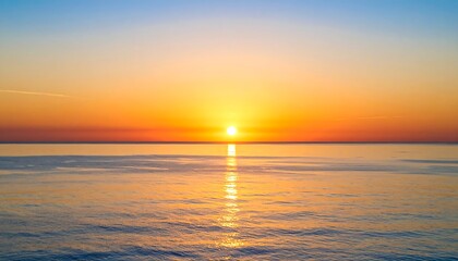 Blurry sunset over calm water