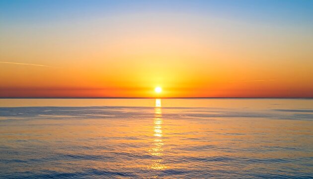 Blurry sunset over calm water