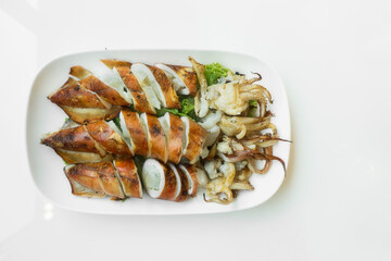 grill squid , charcoal grilled style , asian street food concept