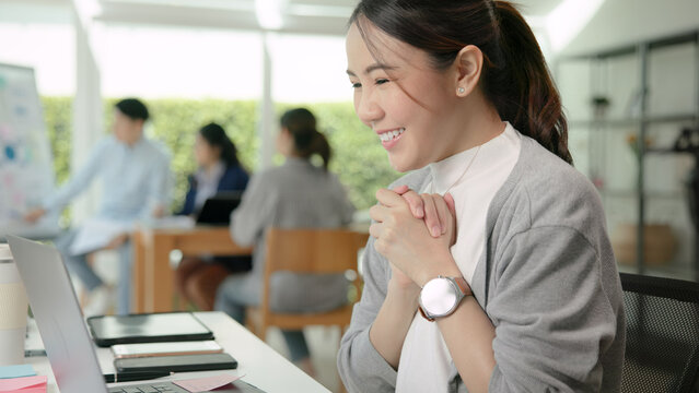 Young adult people asia woman relax smile finish work at office desk receive good news email happy joy bonus pay, win sale award, order test, job hired exam result, loan money banking approve e-mail.