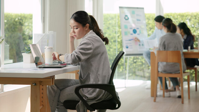 Asia people young adult woman bad day work hard bored data tired at office desk workplace think worry job tough stress asian workforce issue. Mid life crisis mental health illness sad labor effort.