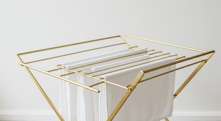 Modern gold clothes drying rack